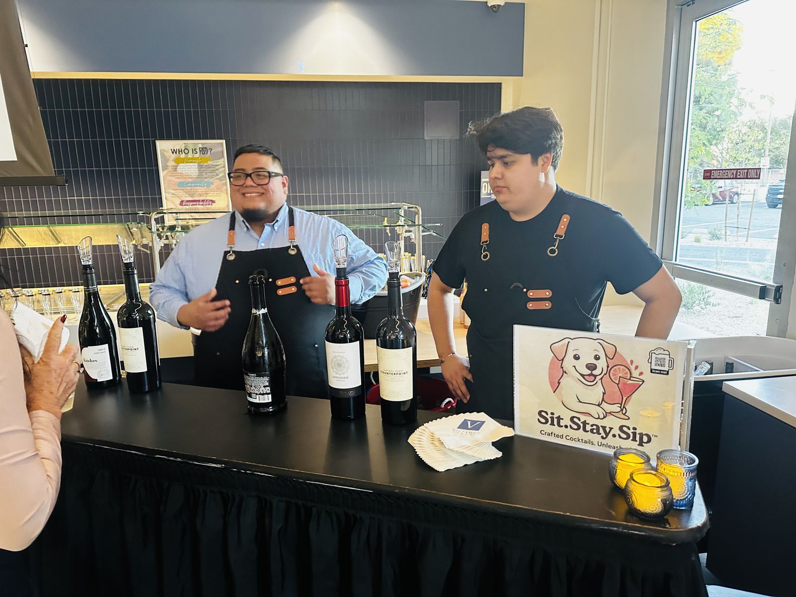 Sit.Stay.Sip. branded bar at a wine tasting event